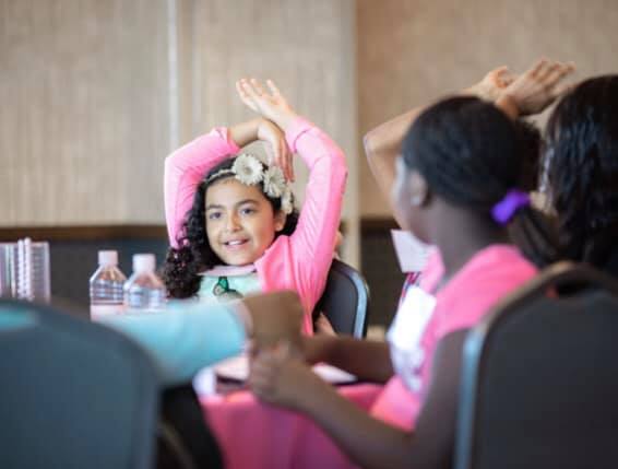A young girl at a Distinctively Her event.
